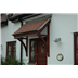 Dark stained Door canopy