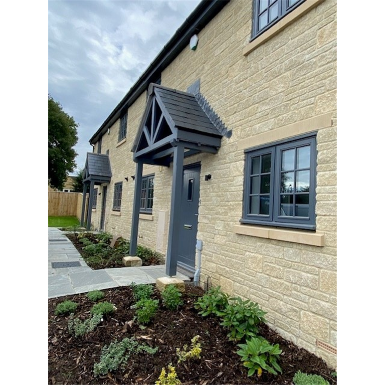 Devon Porch supported on Engineered porch posts. DDA compliant Canopy