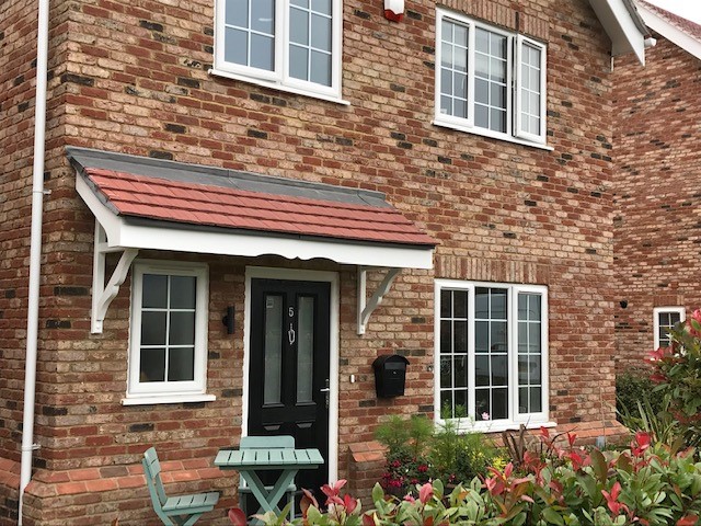 Double lean to timber canopy