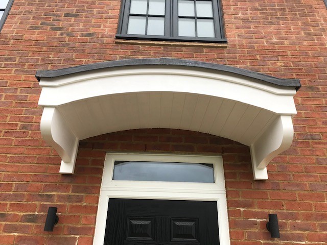 Disley Curved eyebrow timber door canopy- Products code F-DC1