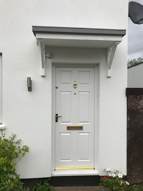 Saddleworth door canopy with zinc roof